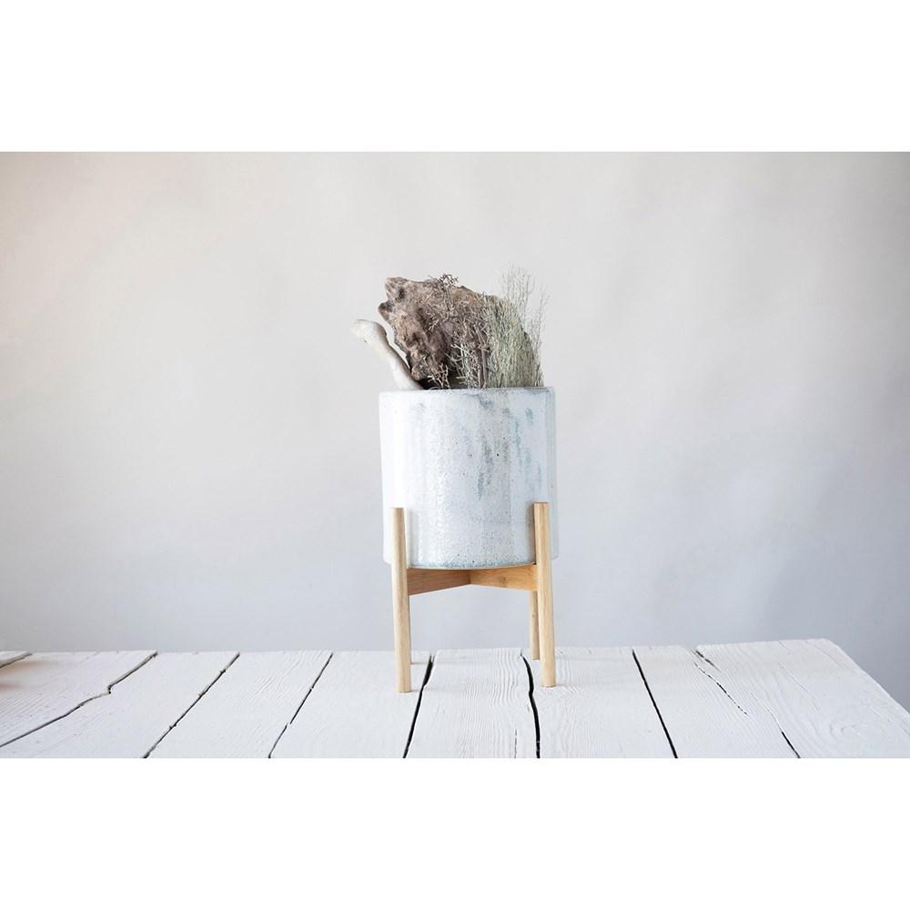 Pot de fleurs en grès avec support en bois