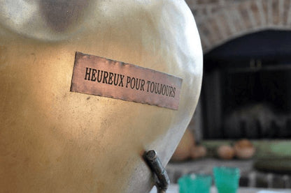 Cœur en métal avec socle en bois recyclé