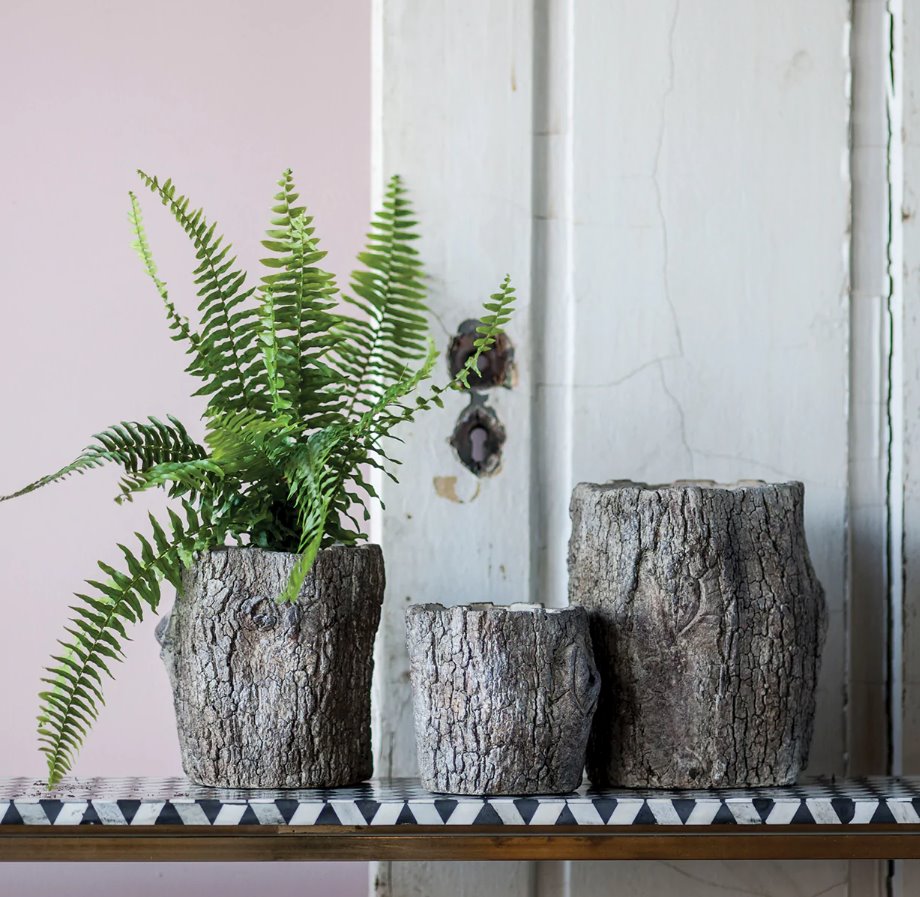 Jardinière en faux bois en forme de bûche