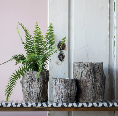 Jardinière en faux bois en forme de bûche