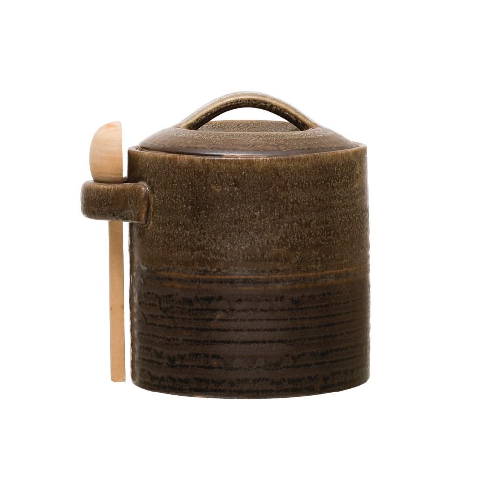 Récipient en grès avec cuillère