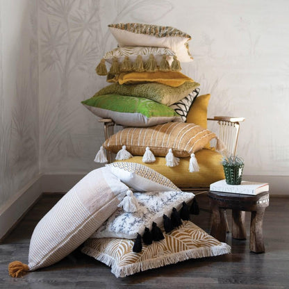 Coussin à motif palmier avec pompons